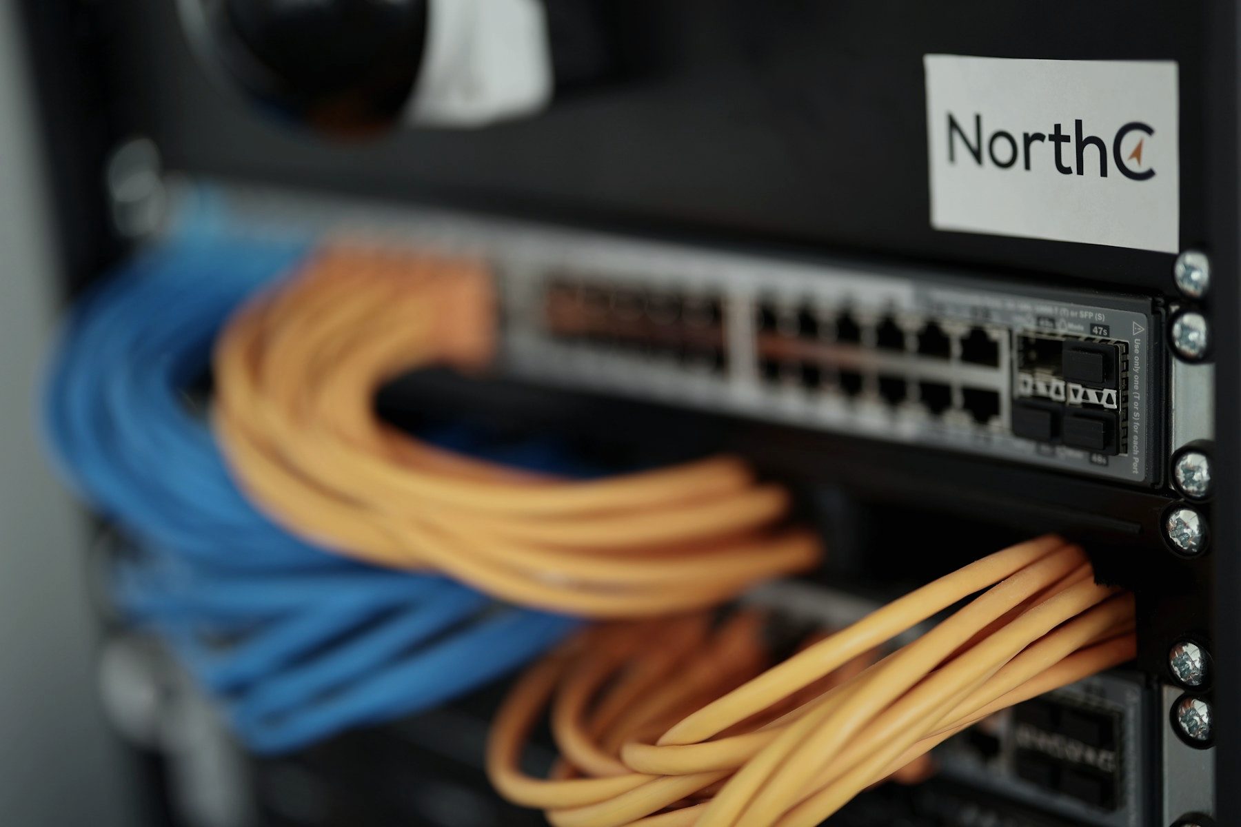 Close-up of a network switch with cables